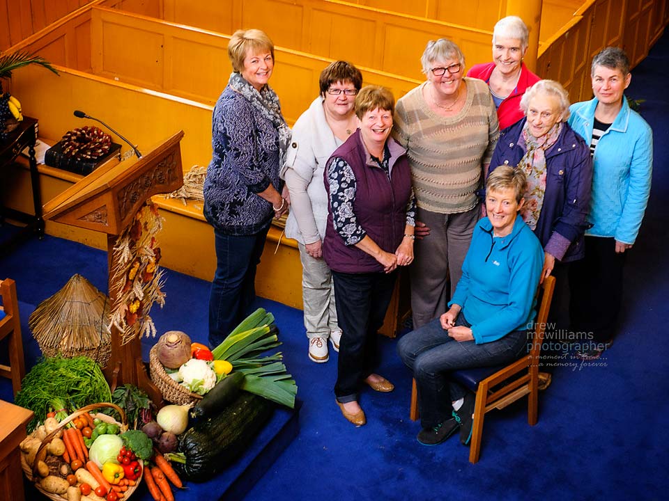 Members of the congregation at Dromore Non-Subscribing Presbyterian Church decorate the church for Harvest