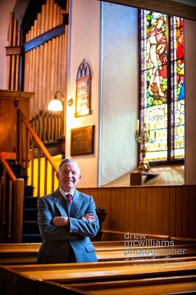 Ernie Martin relaxes in the pews at Dromore Non-subscribing Presbyterian Church
