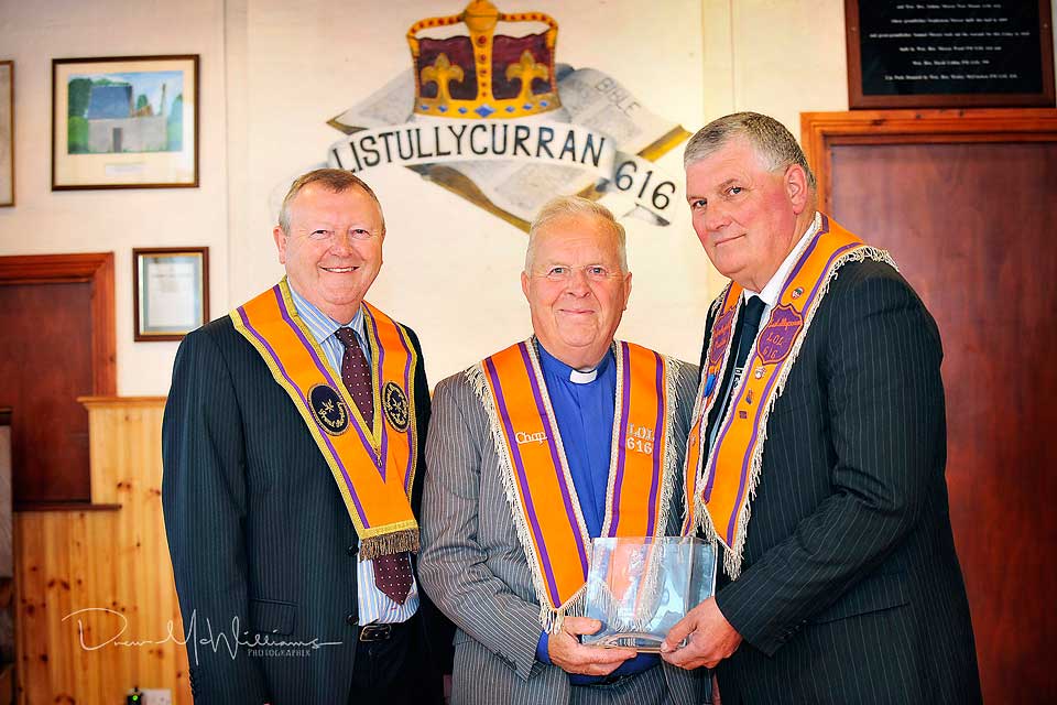 Listullycurran Truth Defenders LOL616 made a special presentation to Bro. Rev Sam J Peden to mark his term as Moderator of the Non Subscribing Presbyterian Church of Ireland. Included are Drew Nelson (Grand Secretary of the Grand Orange Lodge of Ireland) and Gordon Mateer (Worshipful Master LOL 616). Photo: drewmcwilliams.com
