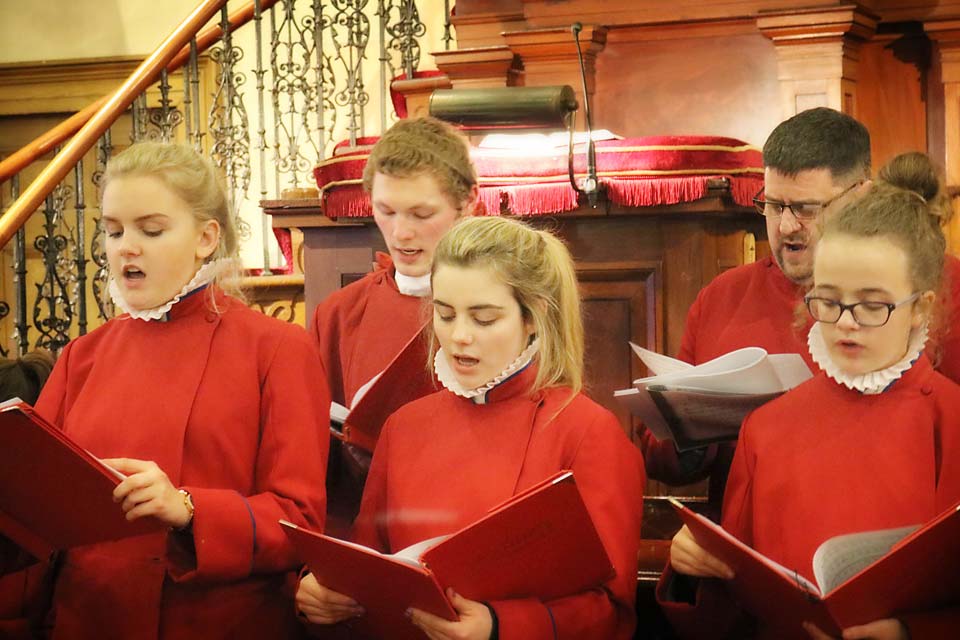 Members of the St Anne’s Cathedral Girls’ Choir singing in Banbridge Non-Subscribing Presbyterian Church
